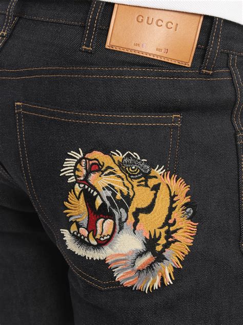 gucci jeans con tigre|gucci tiger jewelry.